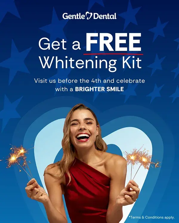 Girl in red dress holding sparklers
